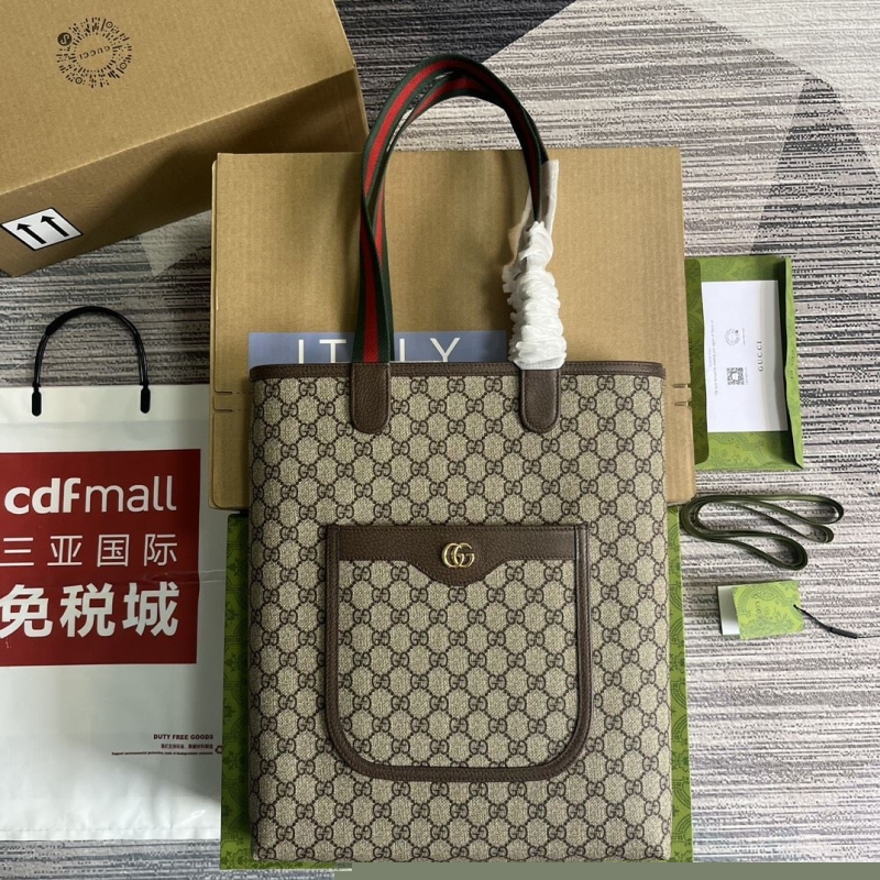 G*u*i shopping bags